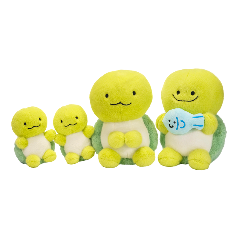 Um conjunto de brinquedos de pelúcia de tartarugas grandes, médias e pequenas