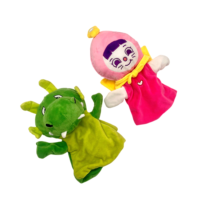 Fantoches de dedo de menina rosa e dragão verde Fantoches de dedo de menina rosa e dragão verde